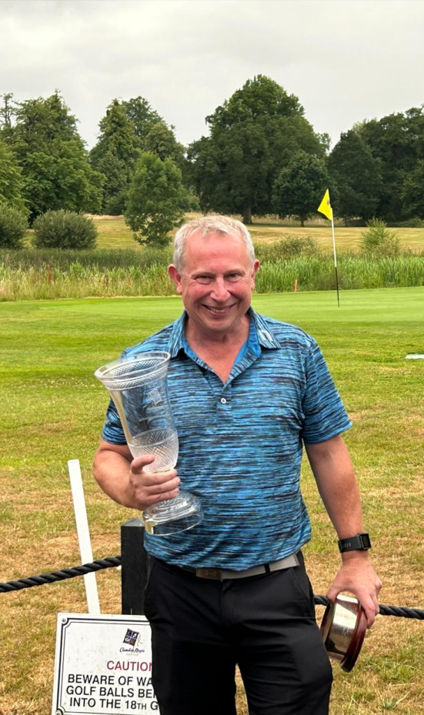 Steve Meehan holding the Clandon Regis Men's Handicap Championship trophy, 2025